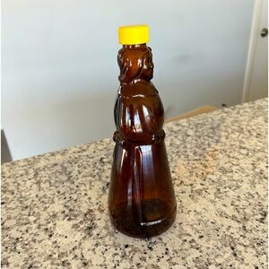 Mrs. Butterworth glass bottle.